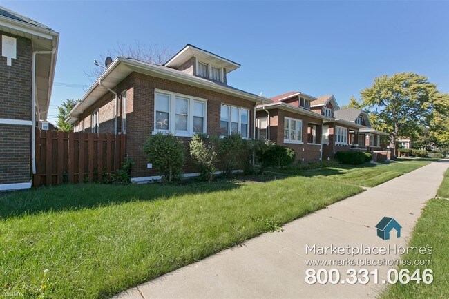 Building Photo - 1346 N Monitor Ave