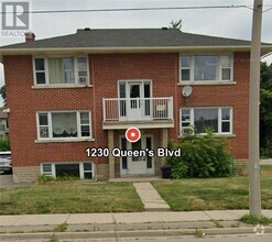 Building Photo - 1230 Queen's Blvd