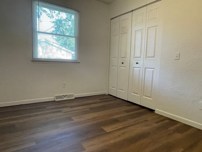 Building Photo - Step into Style: Modern Ranch with Garage ...