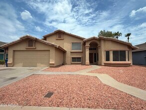 Building Photo - 5570 W Becker Ln