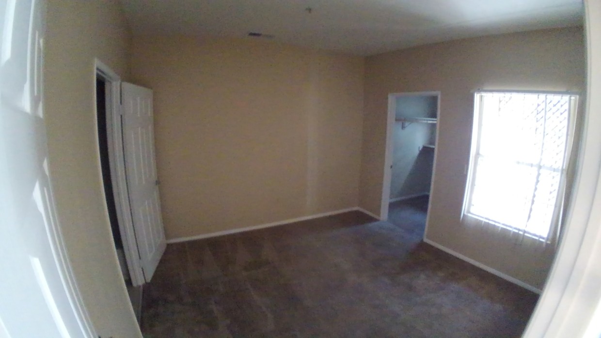 Bedroom with walk in closet - 1121 Golden Ave