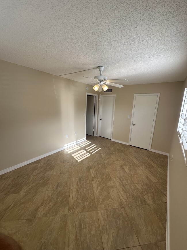 Building Photo - Poinciana Apartments