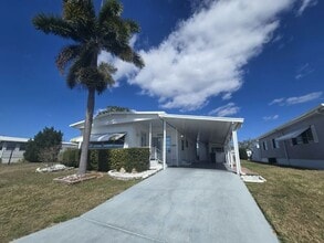 Building Photo - 303 50th Avenue Plaza W