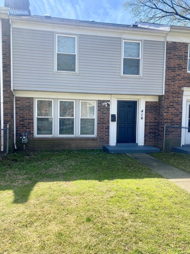 Front of the house is fenced in - 416 W Hill St