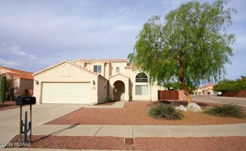Building Photo - 9465 N Elan Ln
