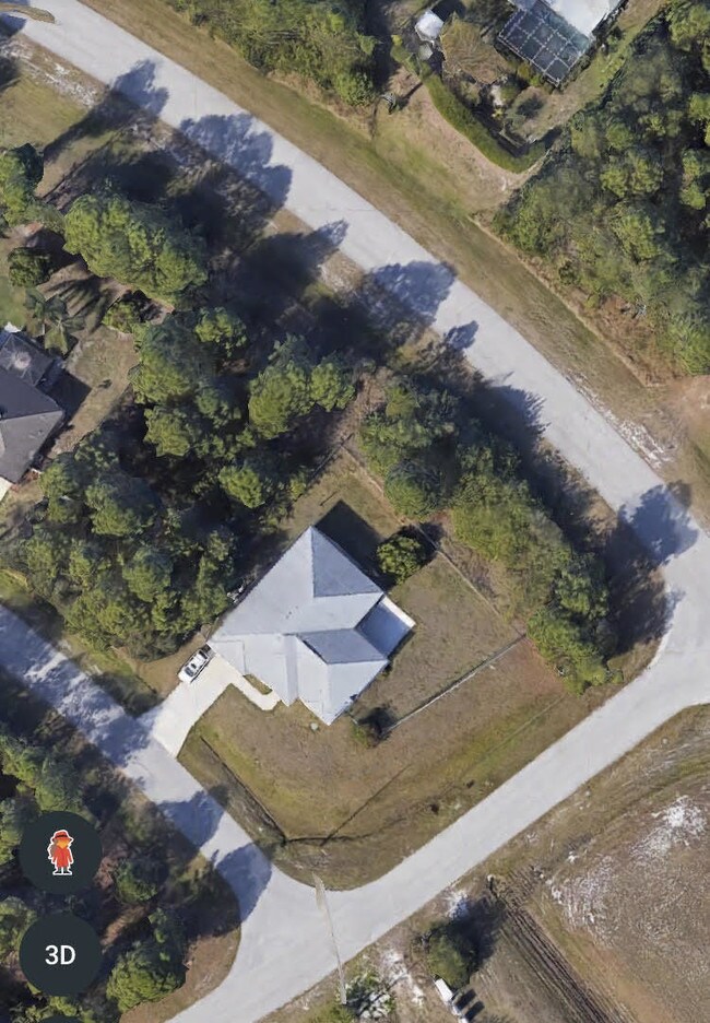 Building Photo - 5574 NW Cruzan Avenue