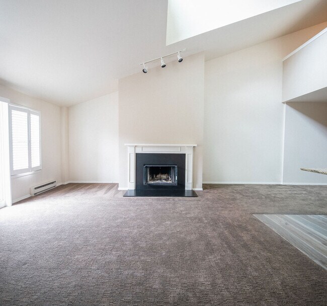 large living room with French doors to outdoor deck - 526 1st Ave S