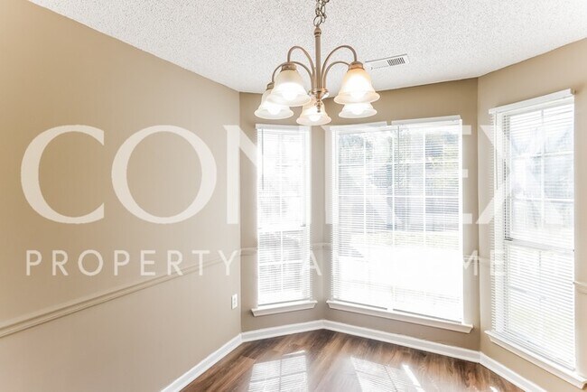Building Photo - Absolutely Adorable -- One Month of Free R...
