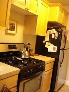 Kitchen with Gas Stove - 701 NE 28th Ave