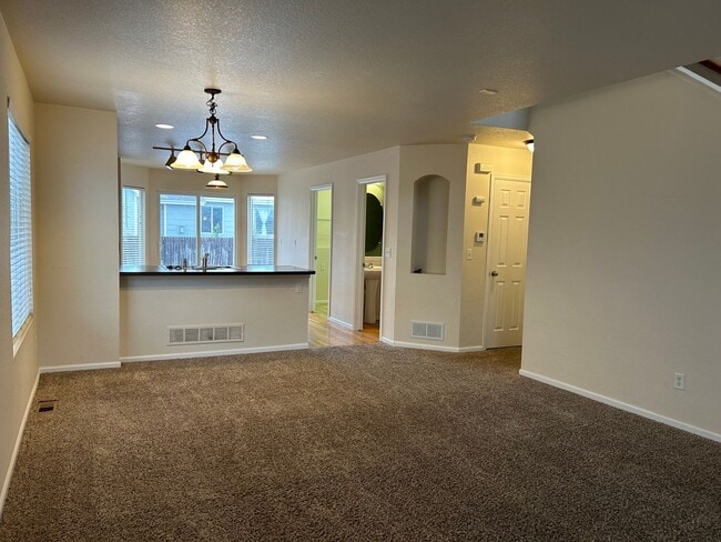 Building Photo - $200 Off First Month! Spacious 3-Bedroom Home with Fenced Yard – Available Now
