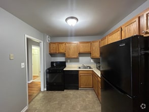 Building Photo - 6099 Park Heights Ave