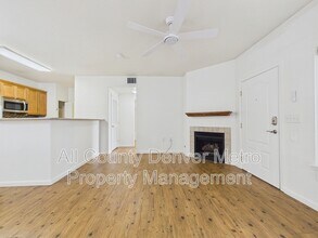 Building Photo - 10239 W 55th Dr