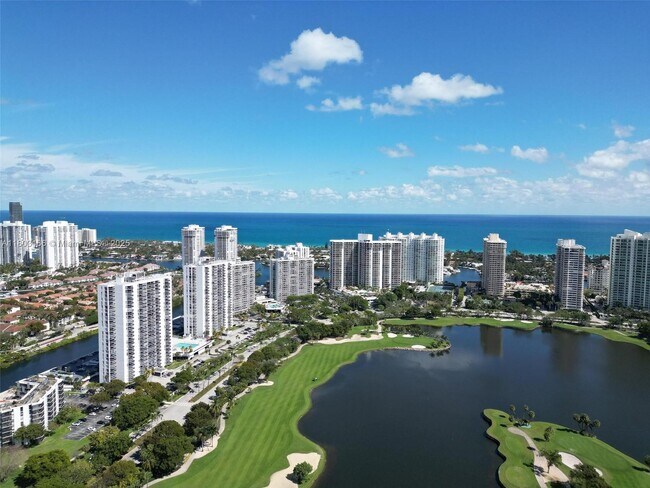 Building Photo - 3675 N Country Club Dr