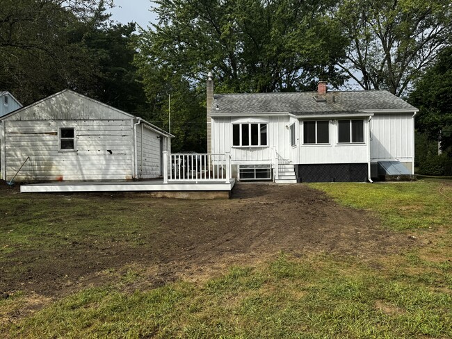 Large attached porch and a new outdoor deck for entertaining - 323 Matthews Rd
