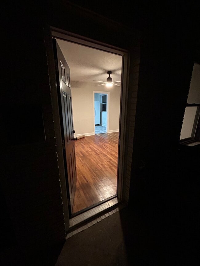 Right front door leads to living room area - 305 Orange St