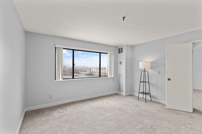 Building Photo - Modern 2BR Condo with Balcony & Amenities Across from Revere Beach