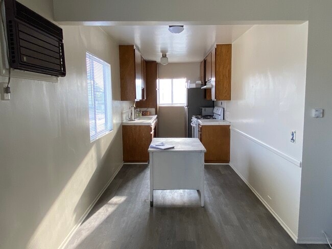 Dinning area and kitchen - 1825 N Berendo St