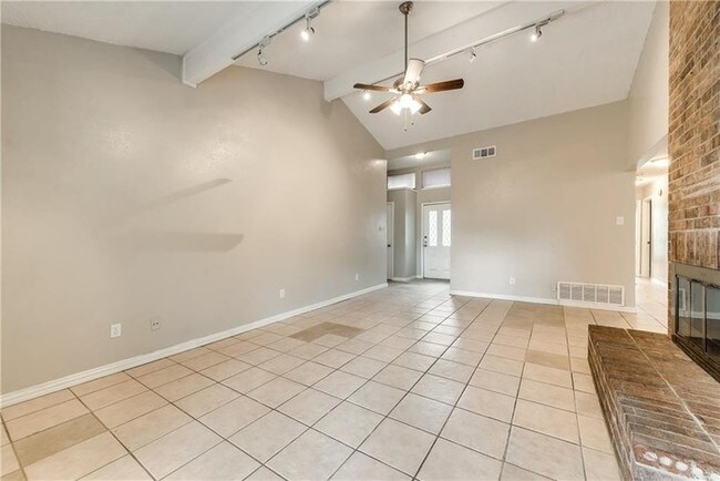Building Photo - 4 Bedroom, 2 Bath with rear entry garage