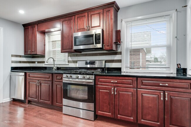 Foto del edificio - 8845 Mango Ave