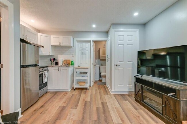 Photo du bâtiment - Stylish 1 Bedroom Unit in Downtown London ...