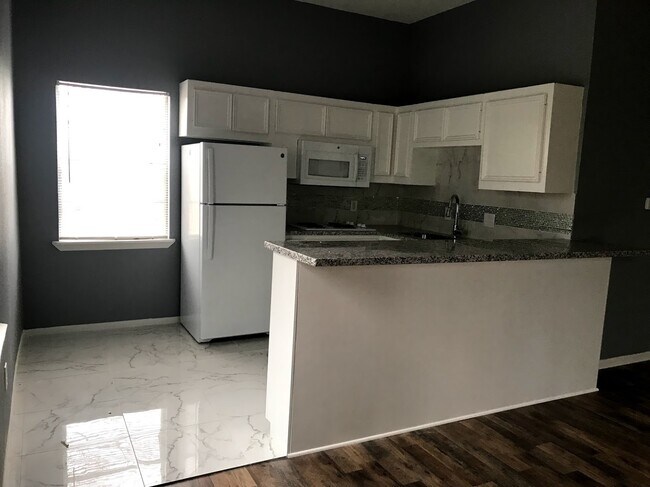 Unit C - kitchen - 7547 Morley St