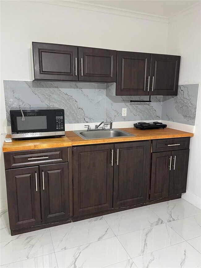 Foto del edificio - 1703 Golfside Village Dr