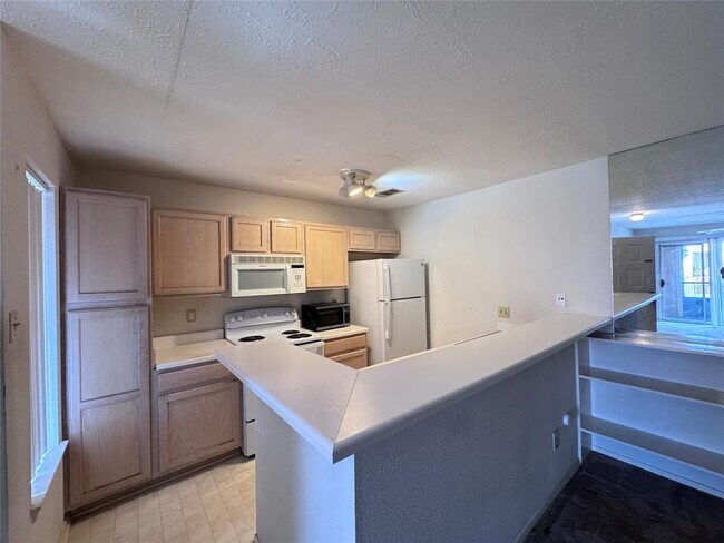 Foto del edificio - 10555 Turtlewood Ct