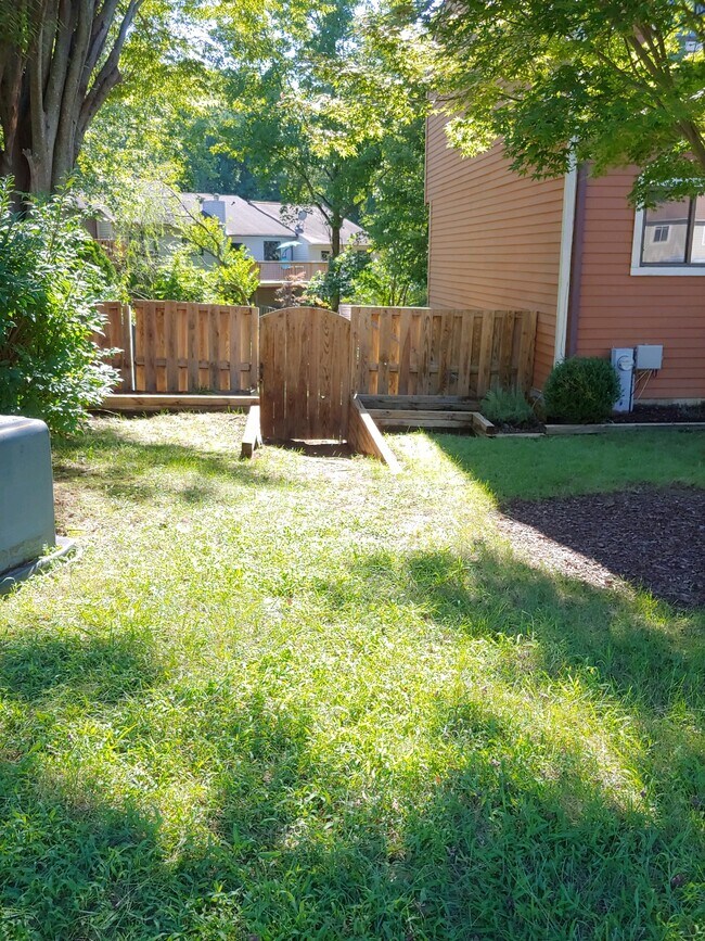 Gate to rear yard - 1188 Gator Ct