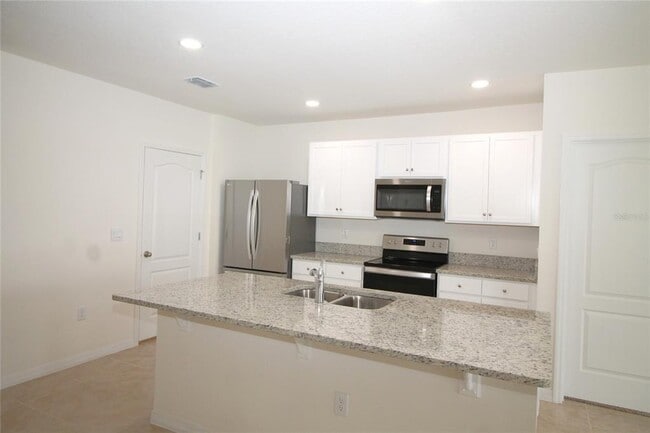 Foto del edificio - 9488 Black Walnut Dr