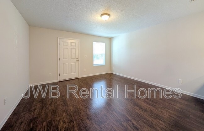 Building Photo - 8431 McGirts Village Ln