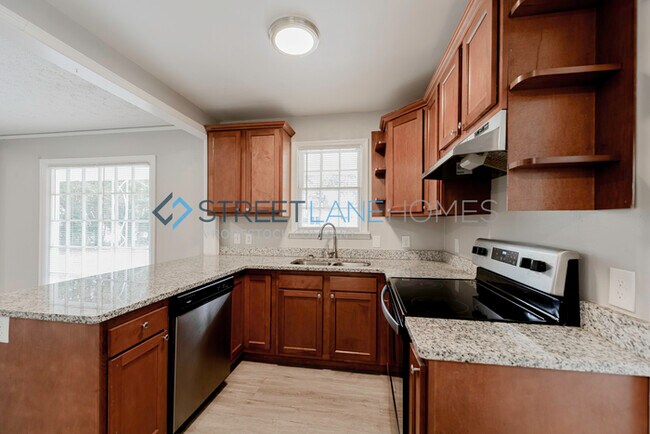 Building Photo - NOW OFFERING HALF OFF THE FIRST FULL MONTH...
