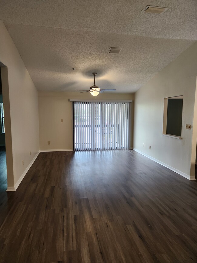 LIVING/DINING AREA - 4029 Crockers Lake Blvd