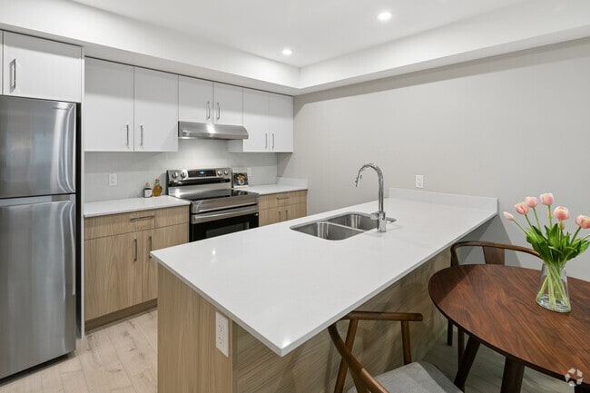 2BR, 2BA - 705SF - Kitchen - Skyside Residences