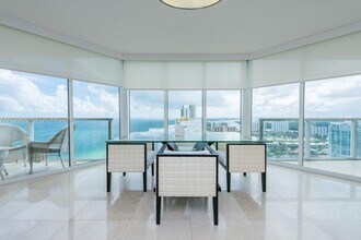 Building Photo - 16699 Collins Ave