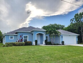 Building Photo - 5834 NW Coosa Dr