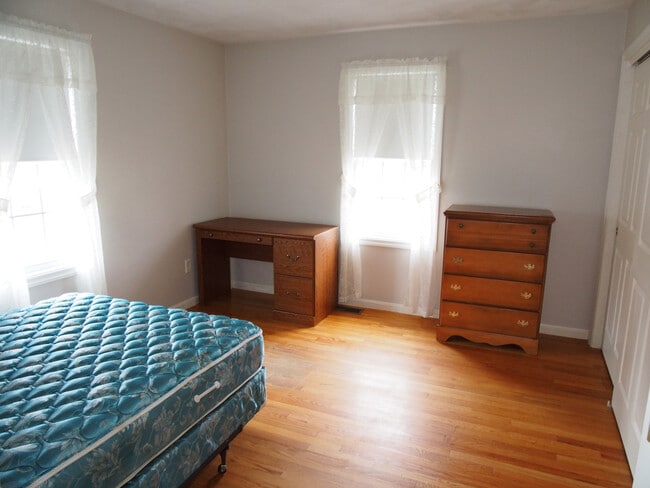 Single room with full bed, desk, chair, dresser, closet, nightstand. - 1278 Osgood St