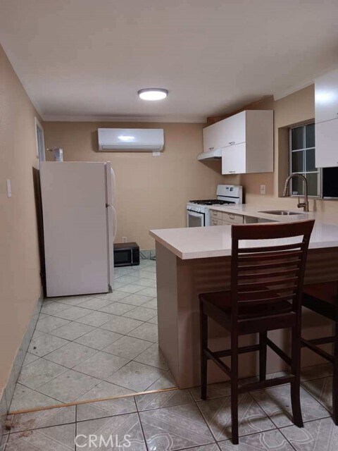 Foto del edificio - 1023 E 22nd St