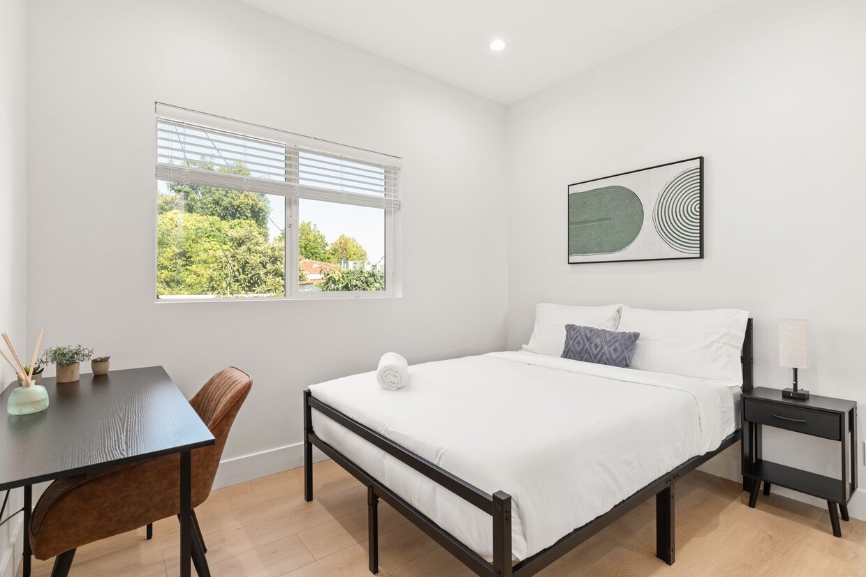 Primary Photo - A 3 Bedroom apartment with ensuite bathrooms, common areas and a fully functional kitchen at 1736...