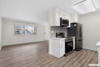 Building Photo - 8650 Belford Ave