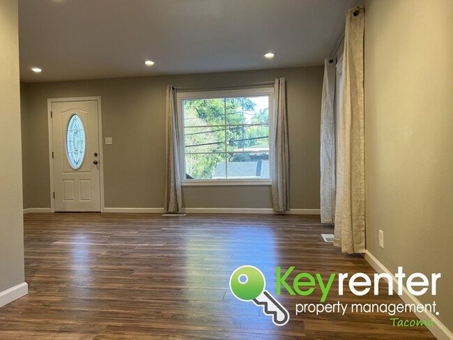 Building Photo - Modern Fircrest Gem: Sleek Design, Quartz Counters & Natural Oasis!