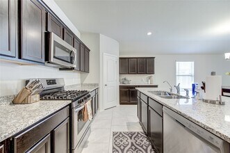 Building Photo - 10110 Pine Trace Village Dr