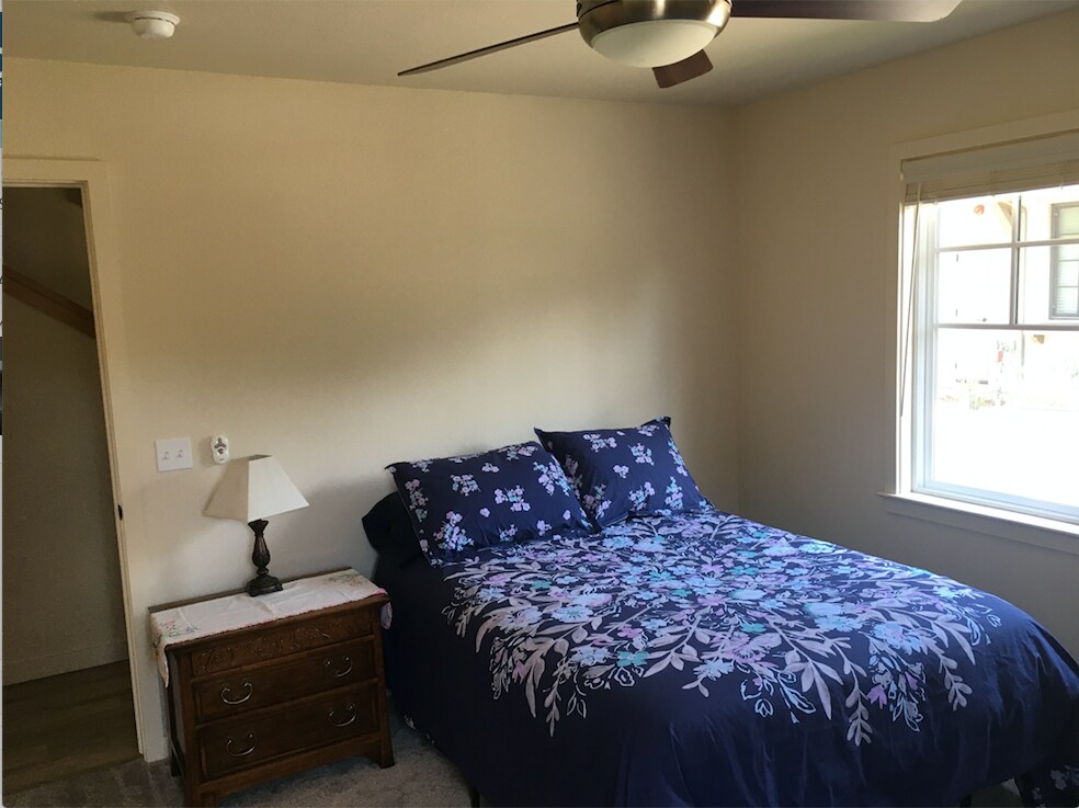 Bedside table and lamp. - 2121 Oak Park Ln