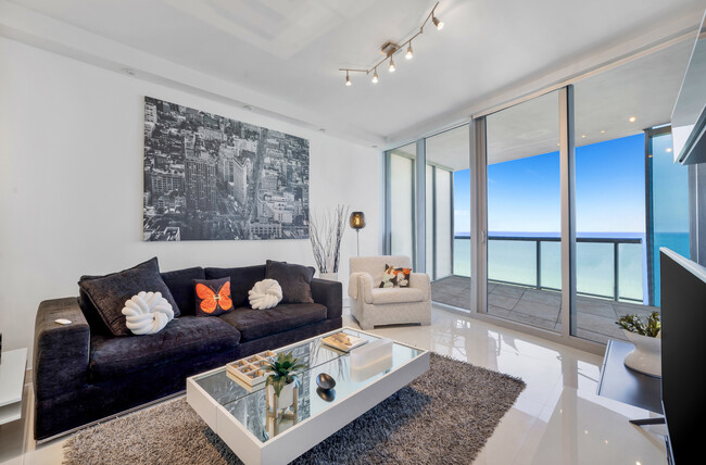 Building Photo - 17121 Collins Ave