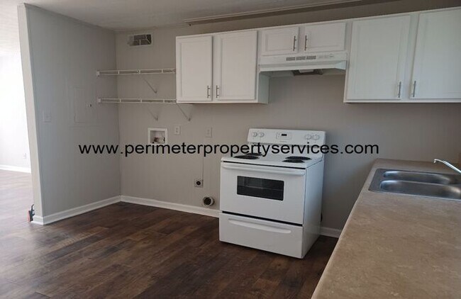 Building Photo - Come See this Amazing Apartment Today!