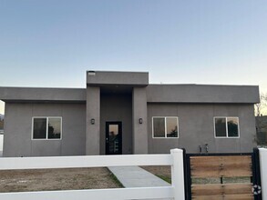 Building Photo - 9308 E Ave T 6