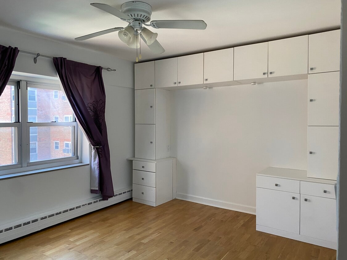 Bedroom with custom cabinets - 4970 N Marine Dr