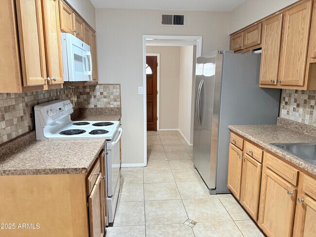 Foto del edificio - 12247 N Cherry Hills Dr W