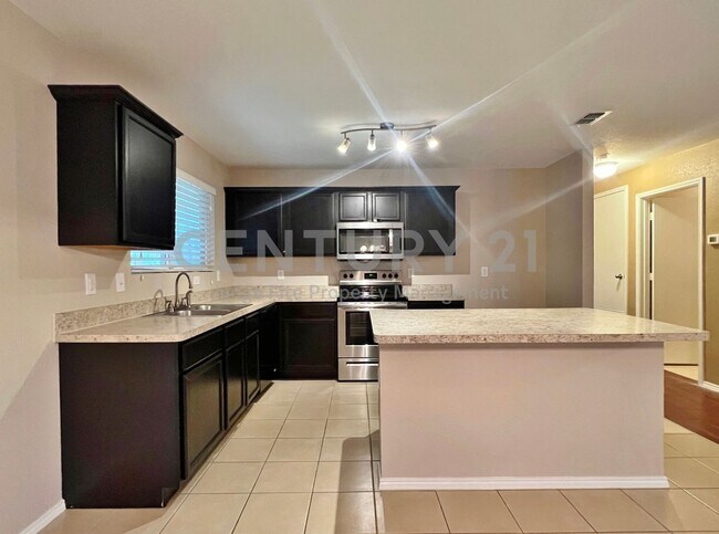 Foto del edificio - 9925 Amaryllis Ln