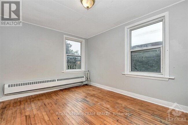 Photo du bâtiment - 63 Sweetland Ave