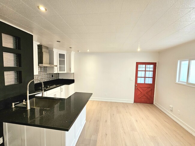 living room and kitchen - 437 W Regent St